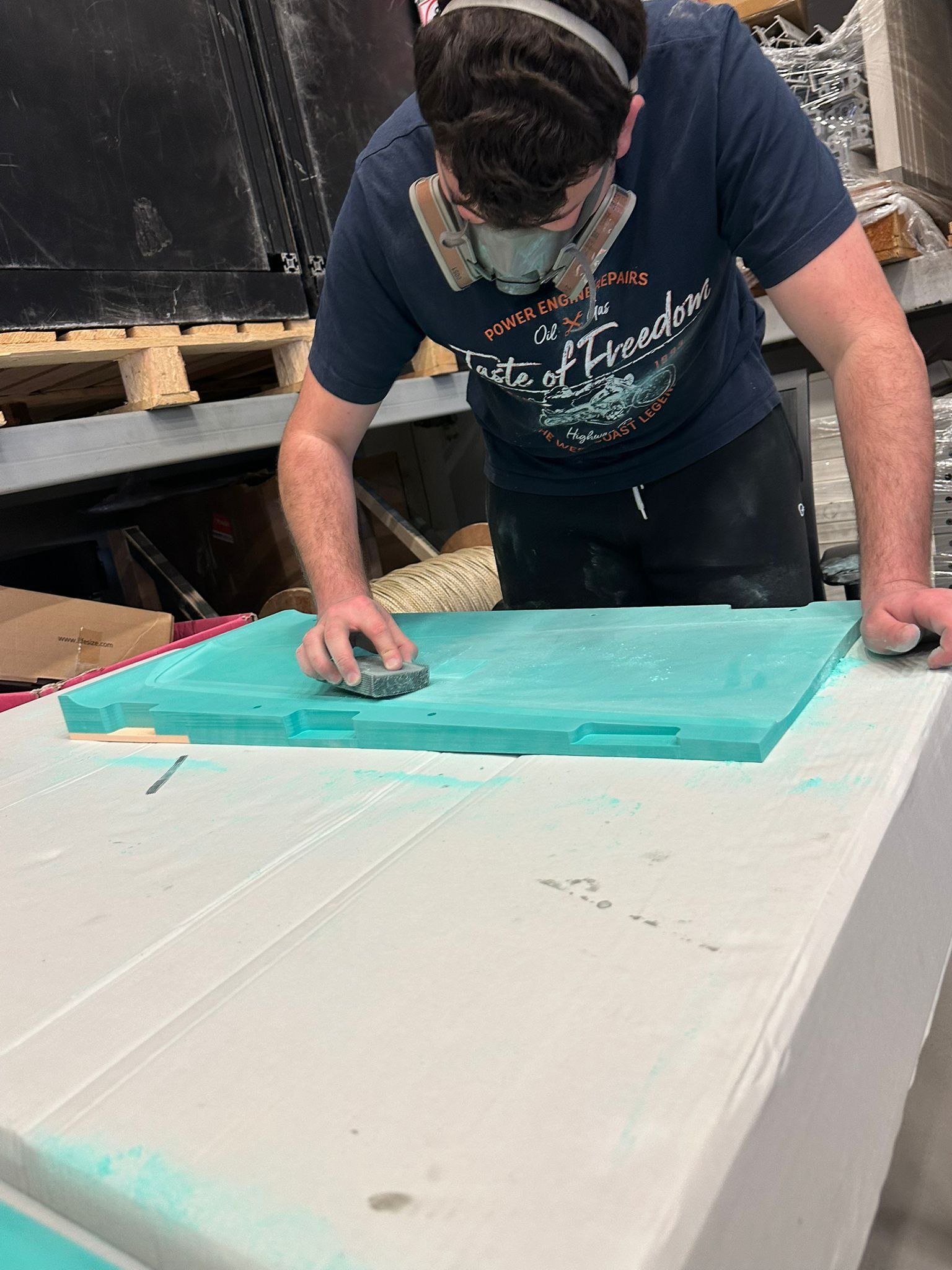Sanding the V-SIX airframe during fabrication